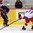 LUCERNE, SWITZERLAND - APRIL 16: USA's Clayton Keller #26 makes a pass while Russia's Dmitri Zhukenov #27 defends during preliminary round action at the 2015 IIHF Ice Hockey U18 World Championship. (Photo by Matt Zambonin/HHOF-IIHF Images)

